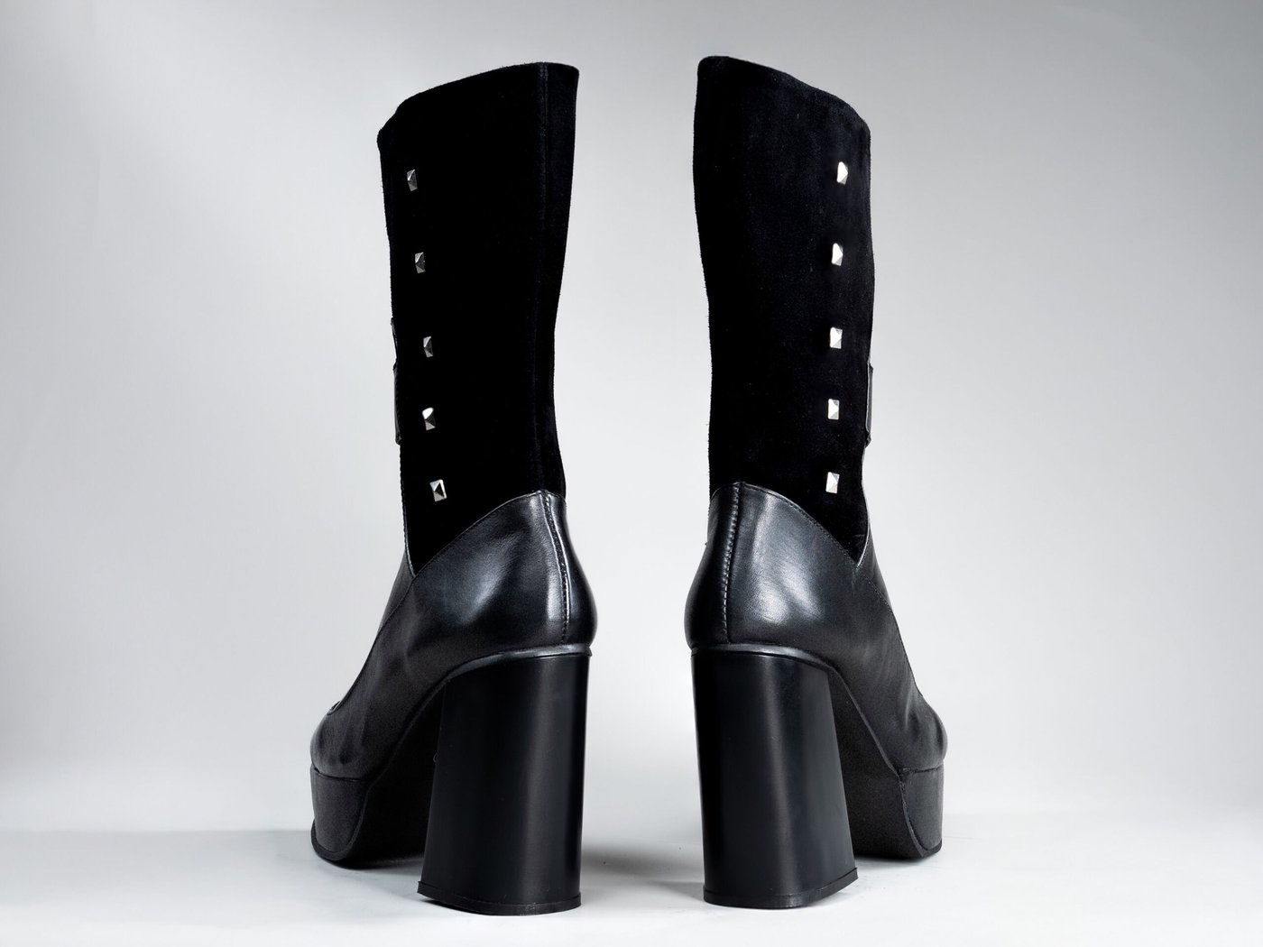 Valentina Black, back view showing calf stretch panels and knee-high shaft